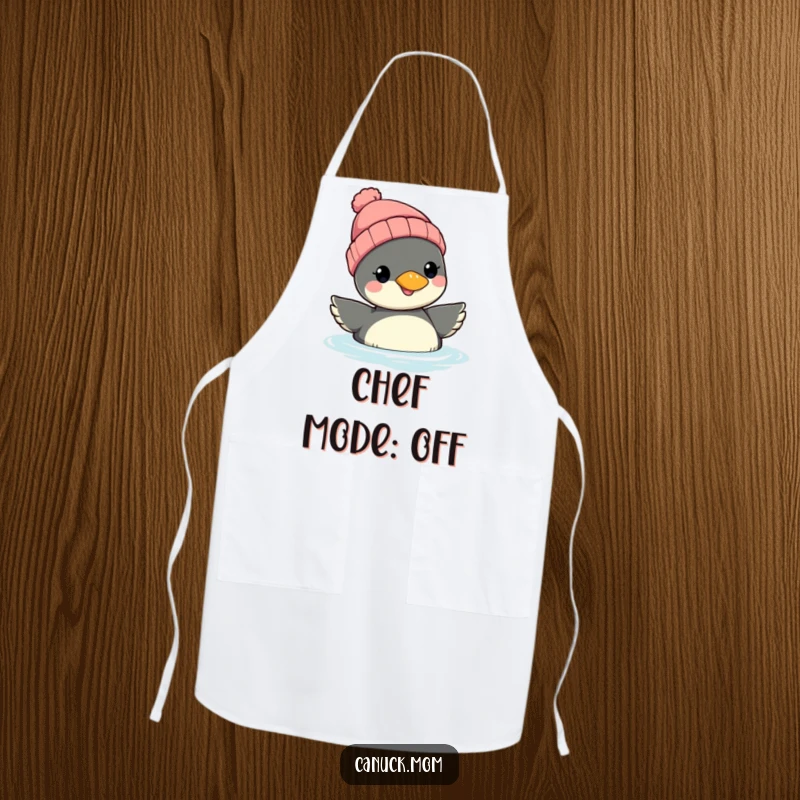 Funny Loon Beanie Apron: A smiling loon wearing a beanie is ready to cook, bringing cheerful humor and protection to the kitchen.