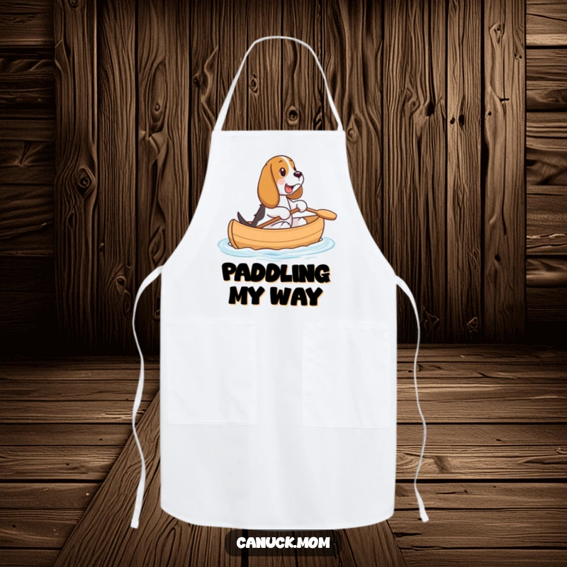 Funny Basset Hound Canoe Apron: A happy Basset Hound rides in a canoe, bringing a smile to kitchen tasks.