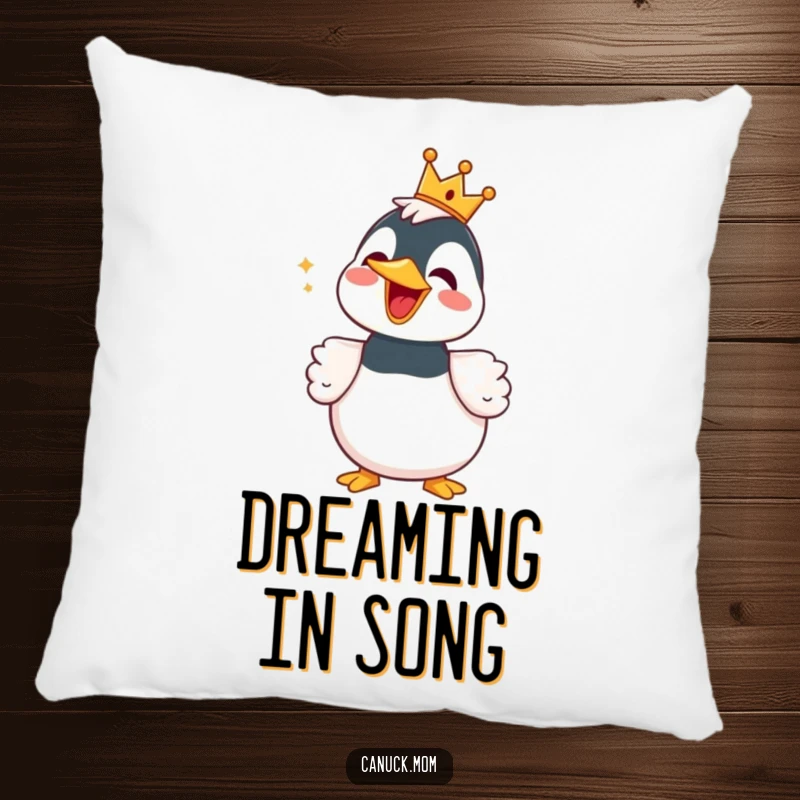 Funny Loon Pillow with a tiny crown, in the midst of a cheerful song, offering plush comfort and humor.
