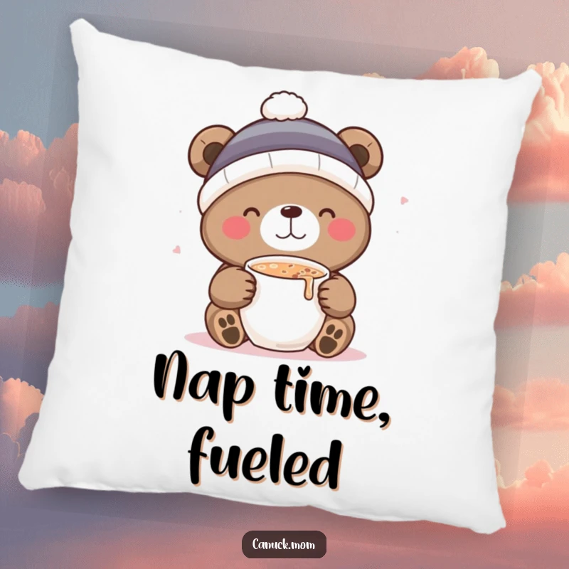 Funny pillow with a cute bear in a toque, happily sipping hot cocoa, offering cozy comfort and a smile.