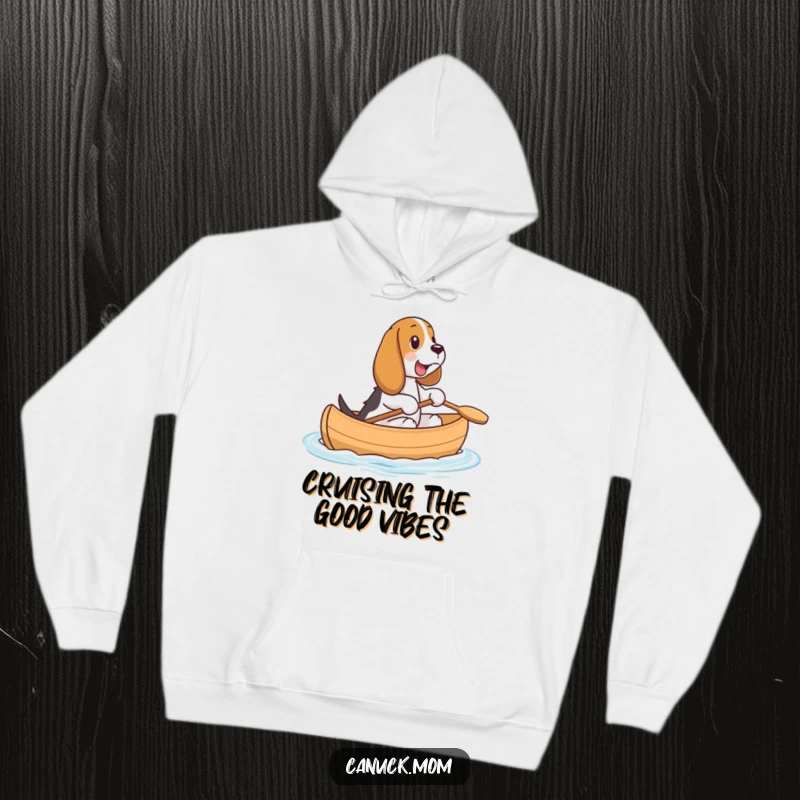 Funny Basset Hound Canoe Hoodie: A content Basset Hound enjoys a serene ride in a small canoe, radiating pure joy.