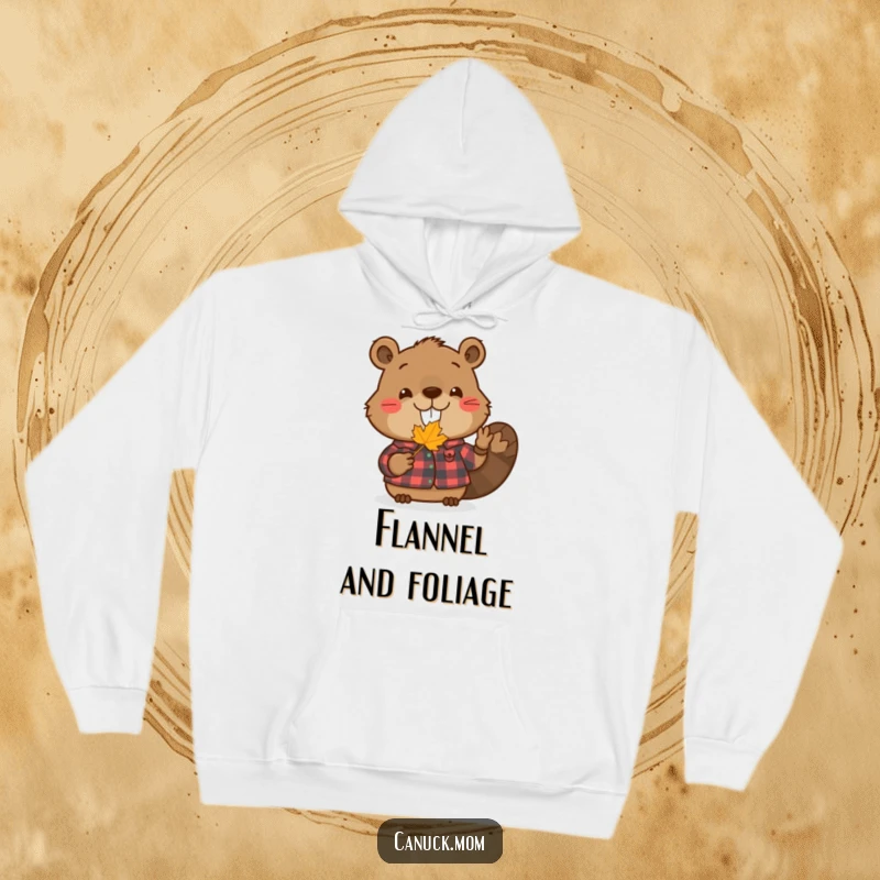 Funny beaver hoodie showing a smiling beaver wearing a flannel shirt, holding a small maple leaf, perfect for staying warm and humorous.