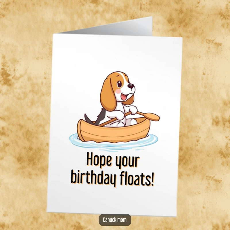 Funny Free Printable Birthday Card: Basset Hound beams with joy while paddling a tiny canoe.