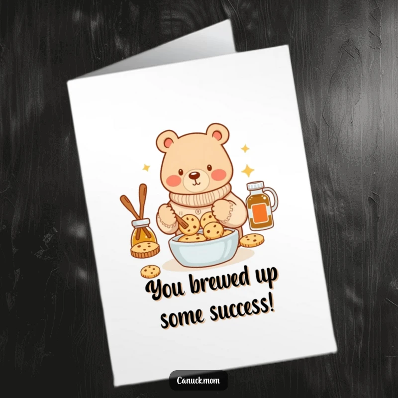 Funny Free Printable congratulations card showing a bear in a cozy sweater baking delicious maple syrup cookies with a smile.