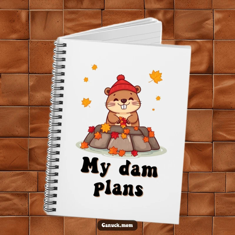 Funny beaver wearing a toque building a dam with maple leaves, on a humorous notebook.