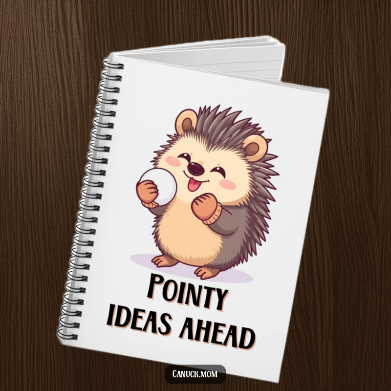 Funny notebook with a happy porcupine wearing mittens, playfully holding a snowball, perfect for jotting down ideas.