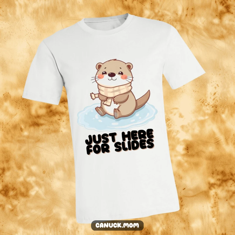 Funny Otter Scarf T-Shirt: A happy otter in a tiny scarf slides playfully on a frozen puddle, radiating pure winter fun.