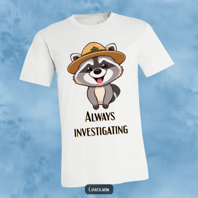 Funny T-shirt featuring a grinning raccoon wearing a park ranger hat, embodying curiosity and woodland adventure.