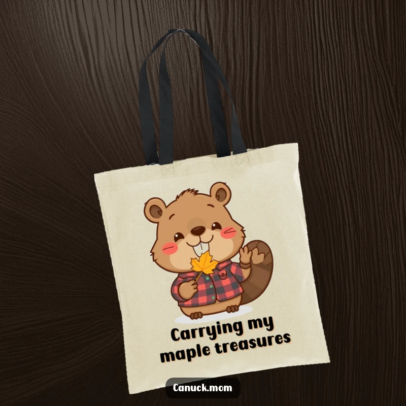 Funny beaver tote bag with a smiling beaver in a flannel shirt holding a tiny maple leaf, perfect for everyday use.